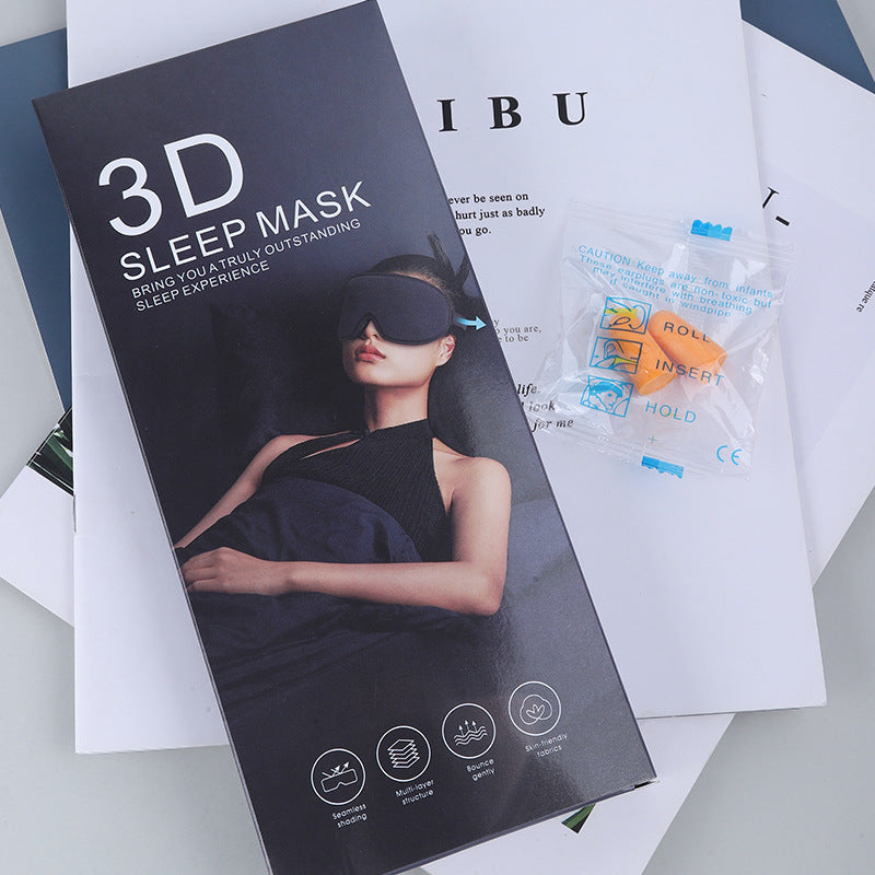3D sleep mask packaging with earplugs on a white surface