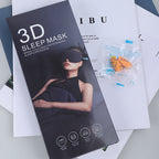 3D sleep mask packaging with earplugs on a white surface