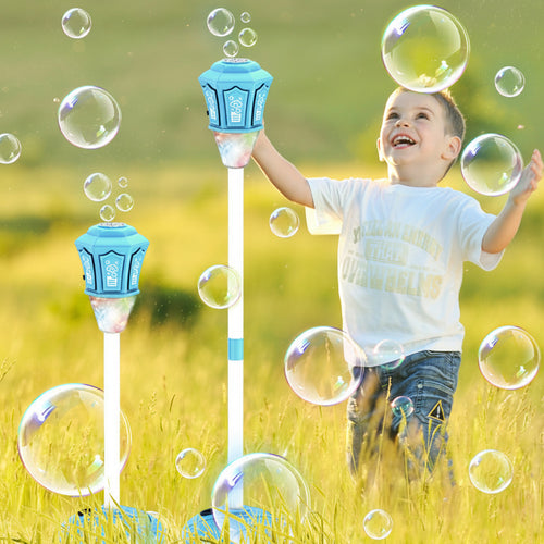 Child playing with bubble wands and bubbles in a grassy field
