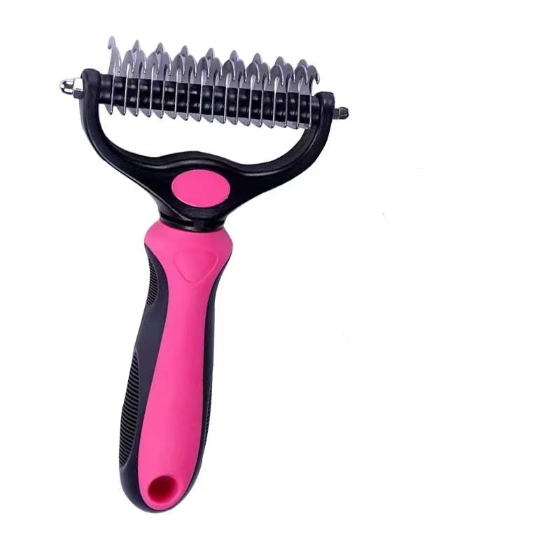 Pet grooming tool with pink handle and metal teeth.