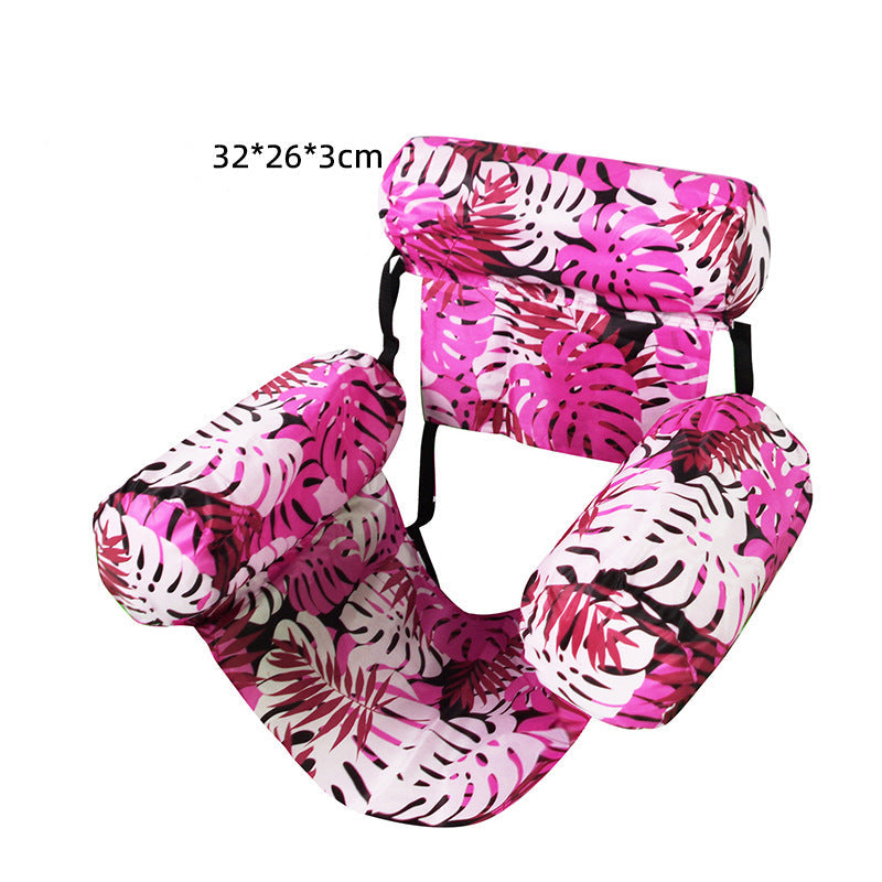 Pink and white patterned inflatable pool float on a white background